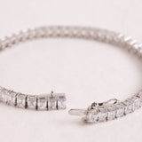 KENSINGTON 10CT EMERALD CUT DIAMOND TENNIS BRACELET